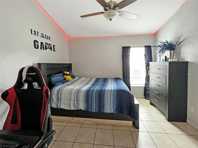 8439 Adele Rd, Lakeland, FL 33810 - bedroom with lofted ceiling, ceiling fan, baseboards, and light tile patterned flooring