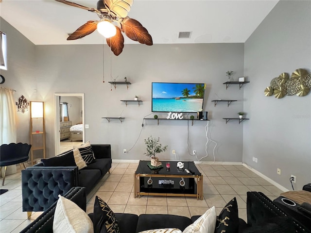 8439 Adele Rd, Lakeland, FL 33810 - tiled living room featuring ceiling fan, baseboards, and visible vents
