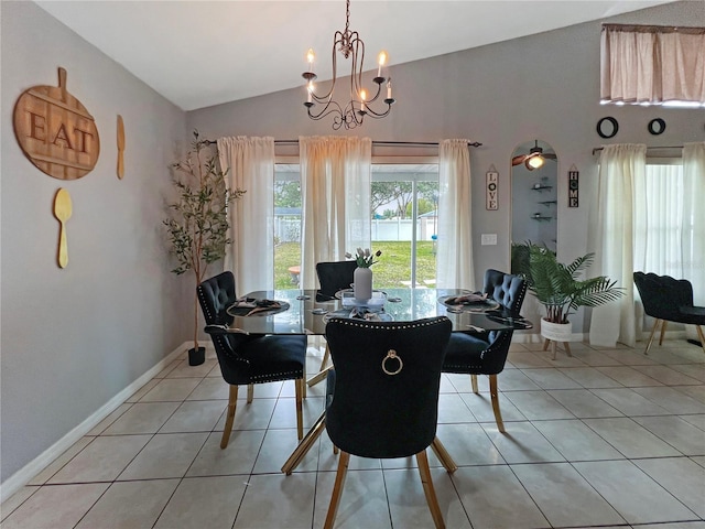8439 Adele Rd, Lakeland, FL 33810 - dining room featuring an inviting chandelier, lofted ceiling, baseboards, and light tile patterned floors