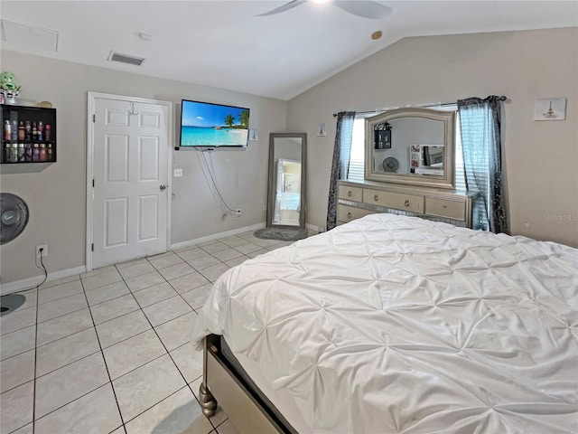 8439 Adele Rd, Lakeland, FL 33810 - bedroom featuring light tile patterned flooring, visible vents, vaulted ceiling, a ceiling fan, and baseboards
