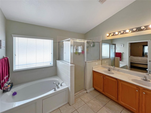 8439 Adele Rd, Lakeland, FL 33810 - full bath with a bath, tile patterned flooring, double vanity, and a sink