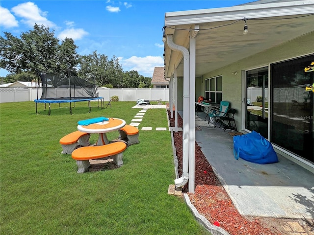 8439 Adele Rd, Lakeland, FL 33810 - view of yard featuring a fenced backyard, a patio area, and a trampoline