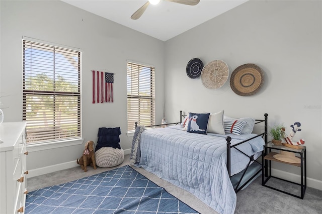 bedroom featuring carpet floors, baseboards, and ceiling fan