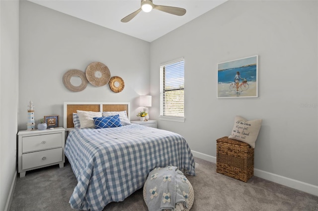 carpeted bedroom with baseboards and ceiling fan