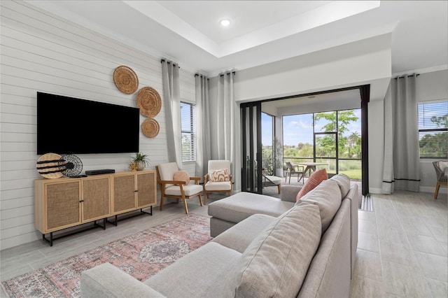 living room with baseboards and recessed lighting