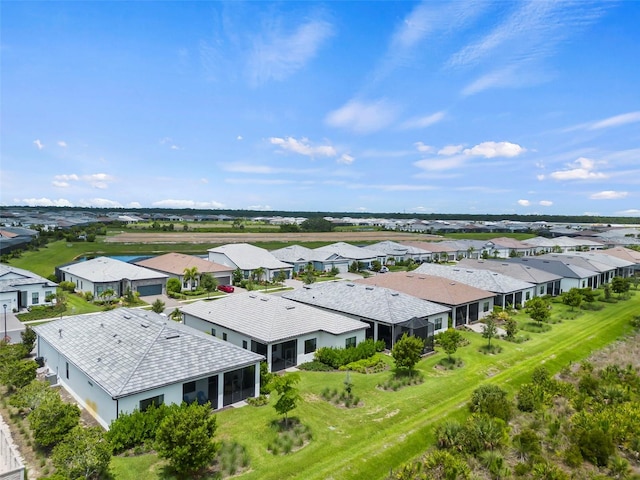 drone / aerial view with a residential view
