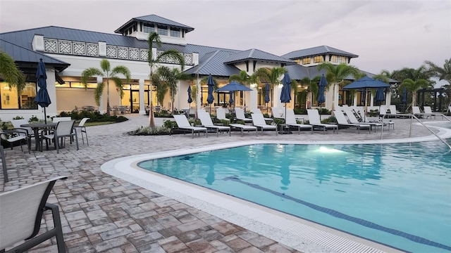 community pool featuring a patio