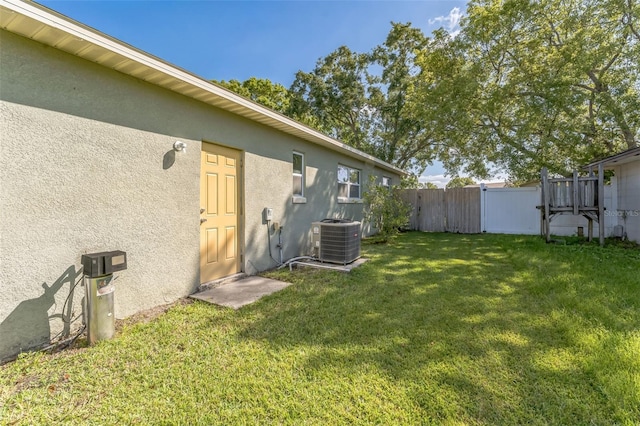view of yard featuring central AC