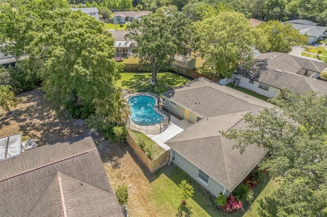 aerial view of residential area featuring a pool area