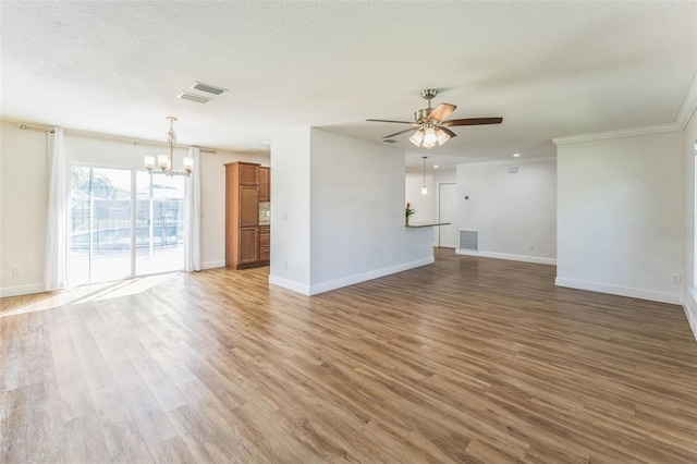 unfurnished living room with a chandelier, a ceiling fan, baseboards, light wood-type flooring, and crown molding
