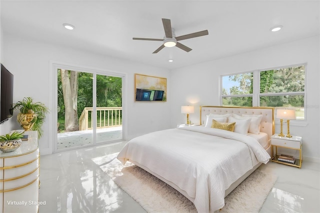 5851 SE Drew Rd, Belleview, FL 34420 - bedroom featuring access to outside, marble finish floor, and multiple windows