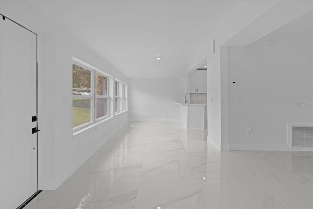 5851 SE Drew Rd, Belleview, FL 34420 - unfurnished room with baseboards, visible vents, and marble finish floor