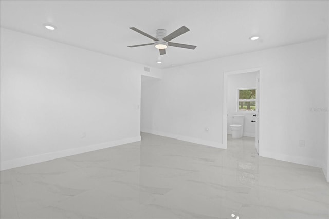 5851 SE Drew Rd, Belleview, FL 34420 - spare room with baseboards, recessed lighting, marble finish floor, and ceiling fan