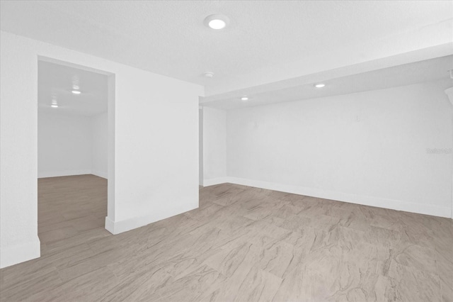 5851 SE Drew Rd, Belleview, FL 34420 - spare room with baseboards and recessed lighting