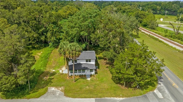 5851 SE Drew Rd, Belleview, FL 34420 - drone / aerial view with a forest view