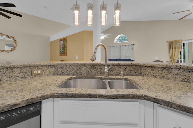 2398 Queenswood Cir, Kissimmee, FL 34743 - kitchen with a ceiling fan, dishwasher, and white cabinets
