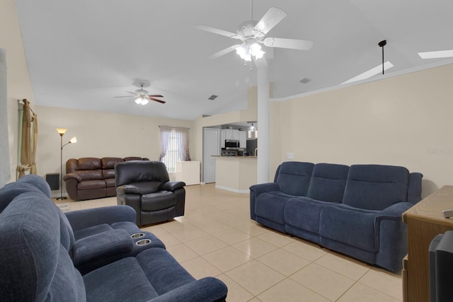 2398 Queenswood Cir, Kissimmee, FL 34743 - living area with a ceiling fan, light tile patterned flooring, and lofted ceiling
