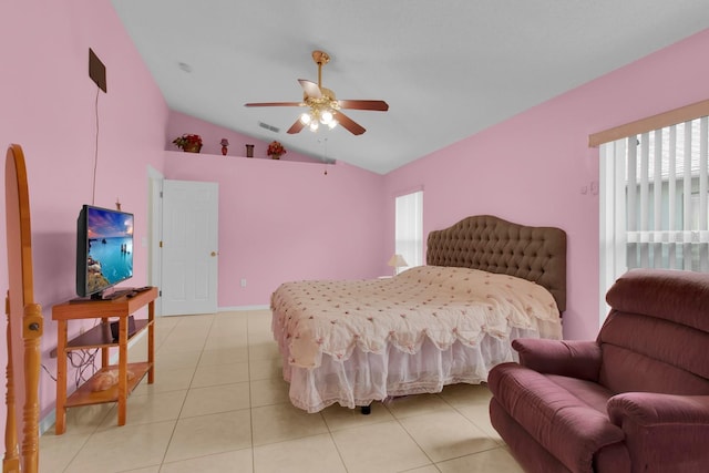 2398 Queenswood Cir, Kissimmee, FL 34743 - bedroom with multiple windows, vaulted ceiling, light tile patterned flooring, ceiling fan, and access to outside