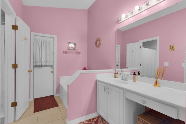 2398 Queenswood Cir, Kissimmee, FL 34743 - bathroom featuring vanity, a bath, and tile patterned floors