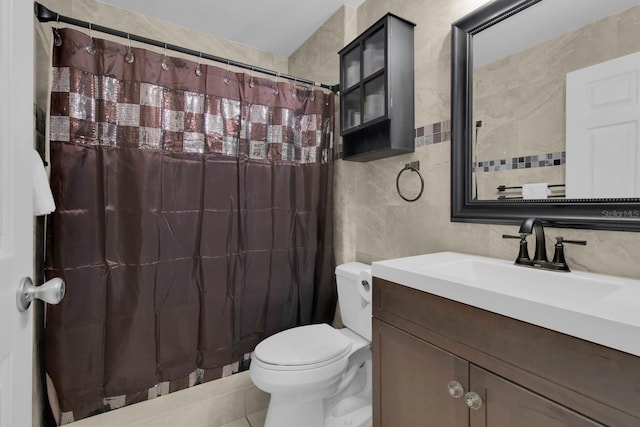 2398 Queenswood Cir, Kissimmee, FL 34743 - full bath with vanity, tile walls, tile patterned flooring, and a shower with curtain