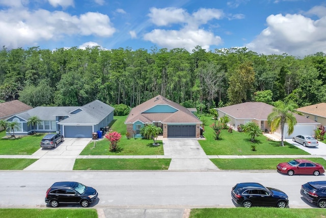 2398 Queenswood Cir, Kissimmee, FL 34743 - view from above of property featuring a forest