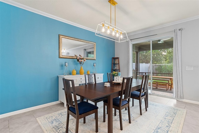 3084 Slough Creek Dr, Kissimmee, FL 34744 - dining area with ornamental molding, light tile patterned flooring, and baseboards