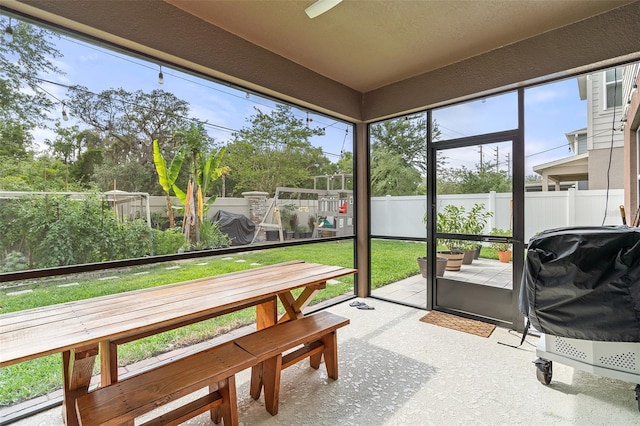 3084 Slough Creek Dr, Kissimmee, FL 34744 - sunroom / solarium featuring a ceiling fan