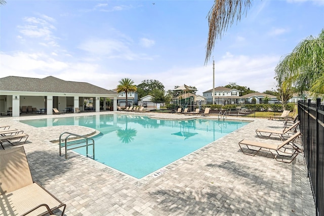 3084 Slough Creek Dr, Kissimmee, FL 34744 - community pool with fence and a patio area