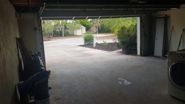 garage featuring washer / clothes dryer