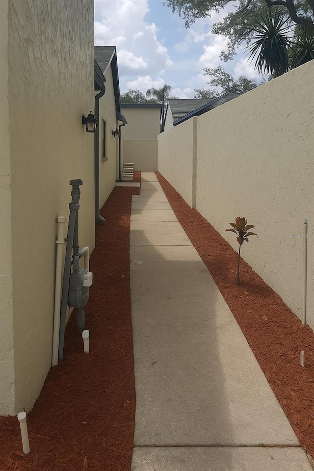 7314 Patio Row, Hudson, FL 34667 - view of property exterior with stucco siding