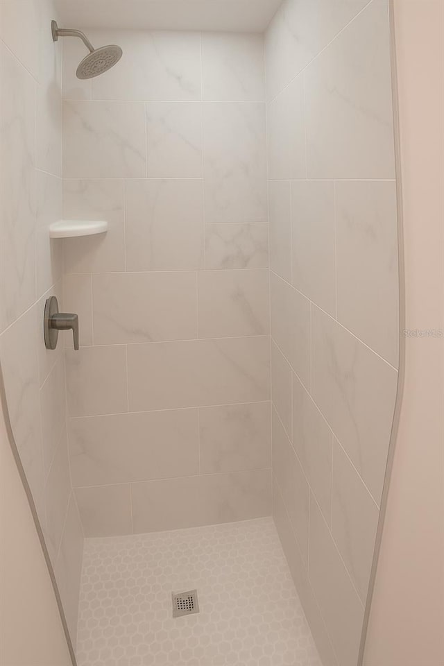 7314 Patio Row, Hudson, FL 34667 - full bathroom with a tile shower