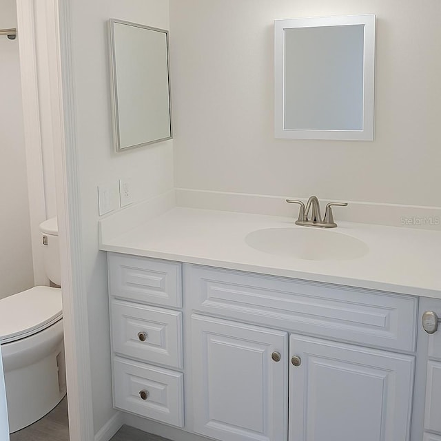 7314 Patio Row, Hudson, FL 34667 - bathroom with vanity and toilet