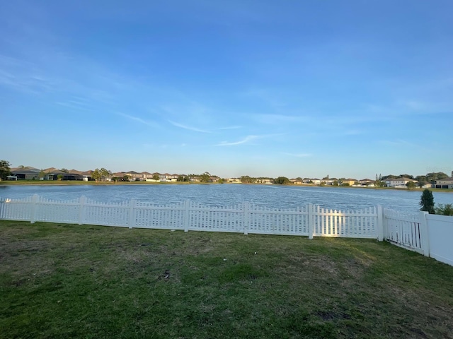 1574 Thetford Cir, Orlando, FL 32824 - water view featuring fence and nearby suburban area