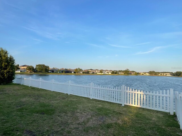 1574 Thetford Cir, Orlando, FL 32824 - water view with fence and nearby suburban area