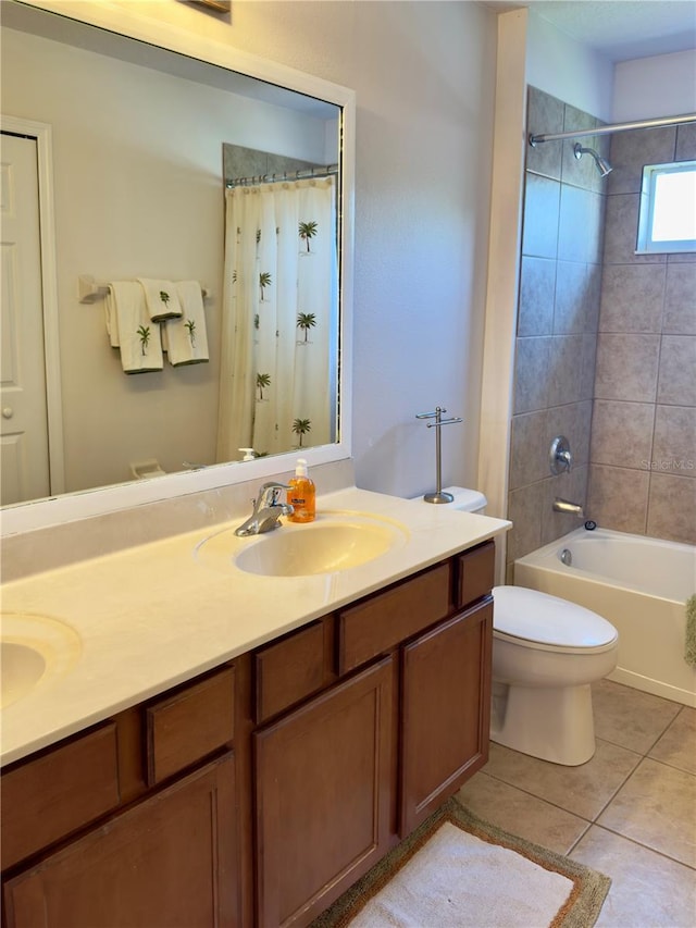 full bath with toilet, shower / tub combo with curtain, a sink, tile patterned flooring, and double vanity