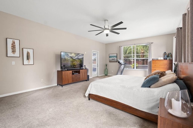 13044 Lakeshore Grove Dr, Winter Garden, FL 34787 - bedroom with baseboards, light carpet, ceiling fan, and access to exterior