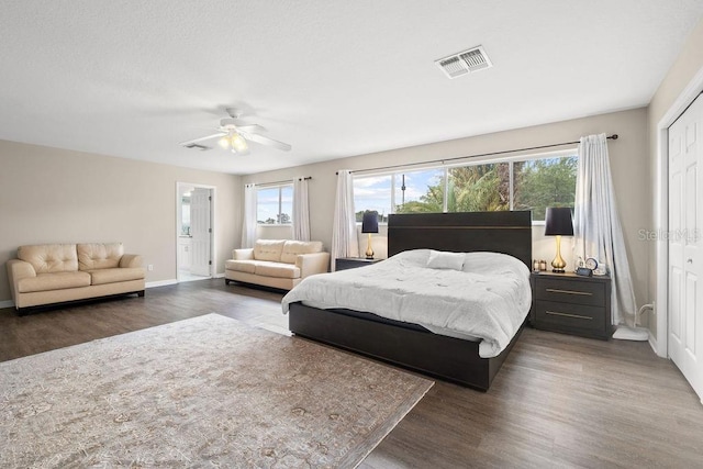13044 Lakeshore Grove Dr, Winter Garden, FL 34787 - bedroom featuring wood finished floors, baseboards, a ceiling fan, and a closet
