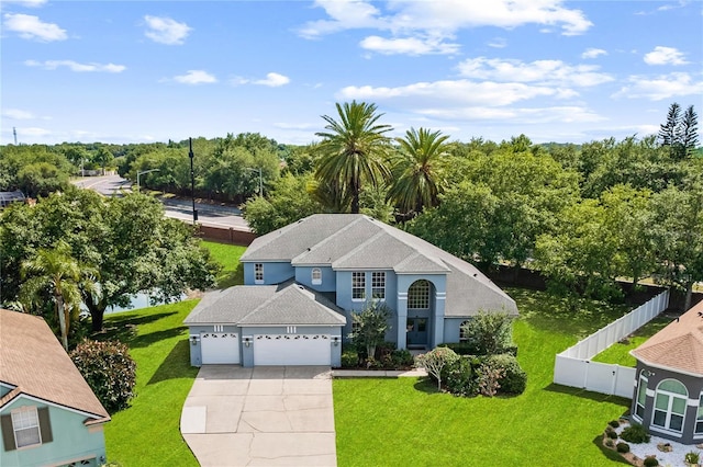 13044 Lakeshore Grove Dr, Winter Garden, FL 34787 - view of front facade featuring driveway and a garage