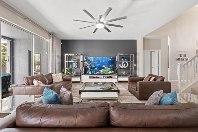 13044 Lakeshore Grove Dr, Winter Garden, FL 34787 - living area with stairway and ceiling fan