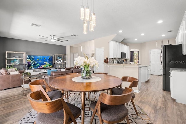 13044 Lakeshore Grove Dr, Winter Garden, FL 34787 - dining space featuring light wood-style flooring, a ceiling fan, and recessed lighting
