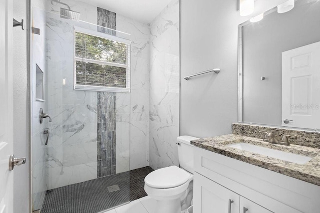 13044 Lakeshore Grove Dr, Winter Garden, FL 34787 - full bathroom with vanity, a marble finish shower, and toilet