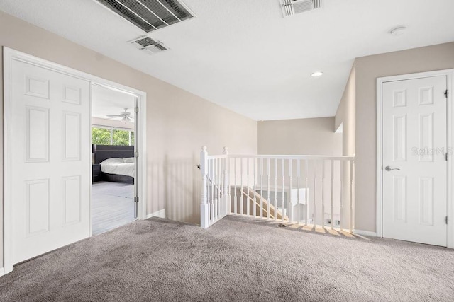13044 Lakeshore Grove Dr, Winter Garden, FL 34787 - corridor with carpet floors, an upstairs landing, baseboards, and recessed lighting