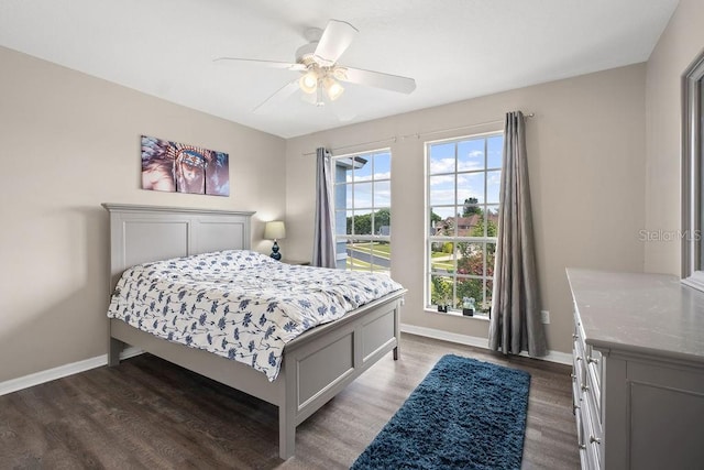 13044 Lakeshore Grove Dr, Winter Garden, FL 34787 - bedroom featuring wood finished floors, baseboards, and ceiling fan