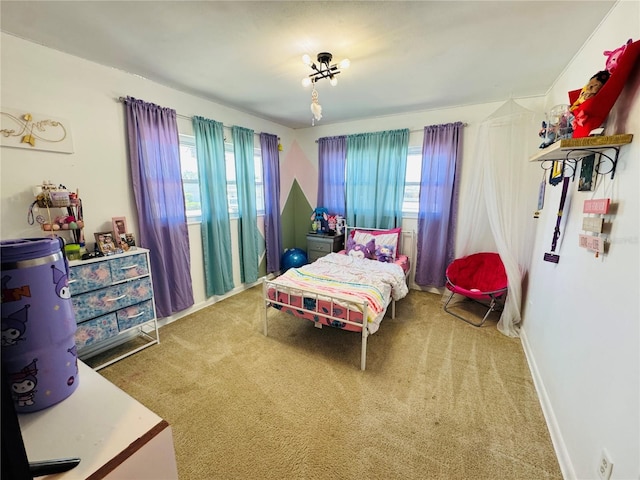 1419 Ave D NE, Winter Haven, FL 33881 - carpeted bedroom featuring multiple windows and baseboards
