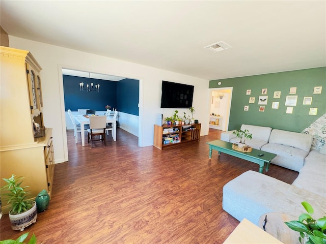 1419 Ave D NE, Winter Haven, FL 33881 - living room with a chandelier and wood finished floors