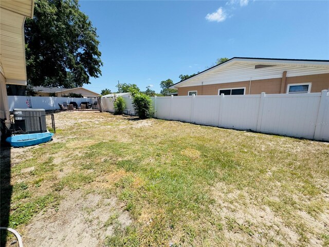 1419 Ave D NE, Winter Haven, FL 33881 - view of yard featuring central air condition unit