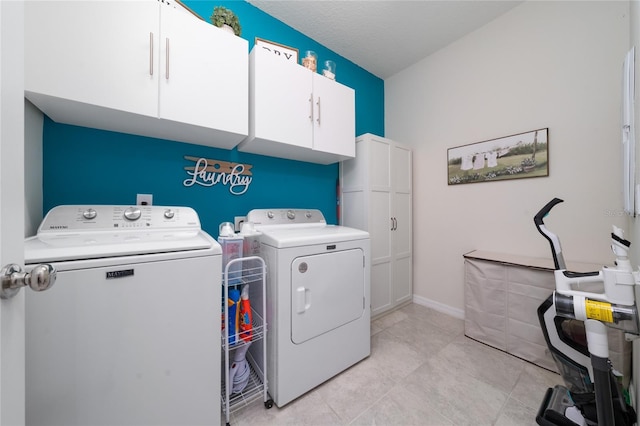 laundry room featuring cabinet space and independent washer and dryer