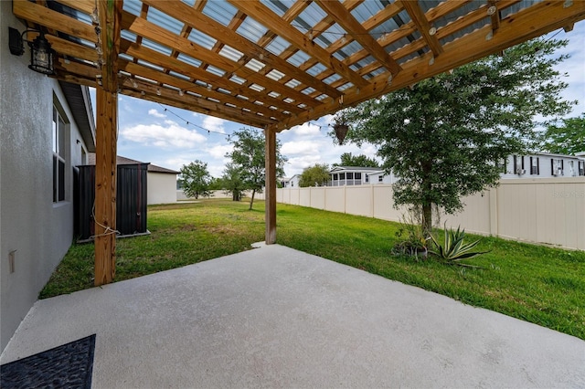 view of patio / terrace featuring a pergola and fence