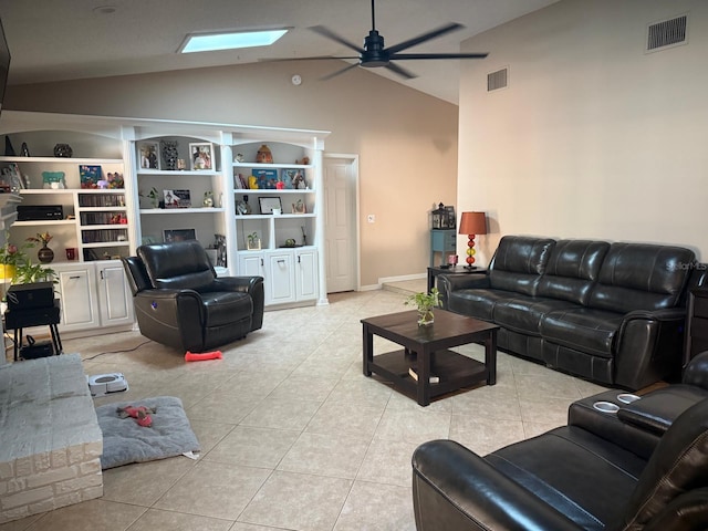 living area with a ceiling fan, light tile patterned floors, and visible vents