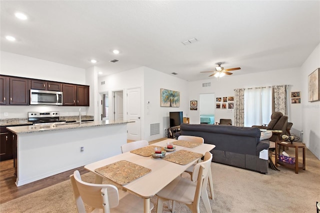5816 Beefmaster Rd, Saint Cloud, FL 34771 - dining area featuring a ceiling fan and recessed lighting